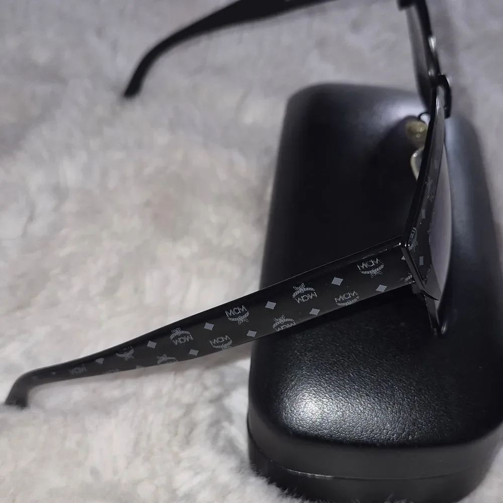 MCM Black Frame Sunglasses with Blue Mirrored Lenses